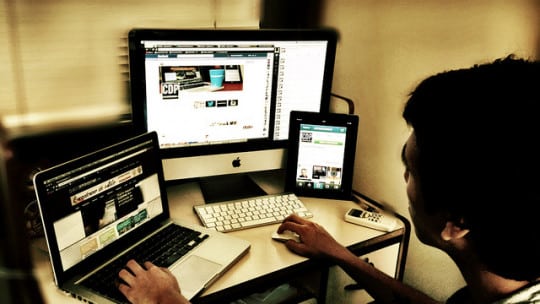Journalist at work on multiple platforms