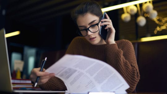 woman working on phone