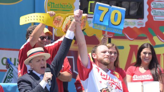 Joey Chestnut & George Shea mark JULY 4 2016 Nathan's Famous Fourth of July Hot Dog Eating Contest centennial
